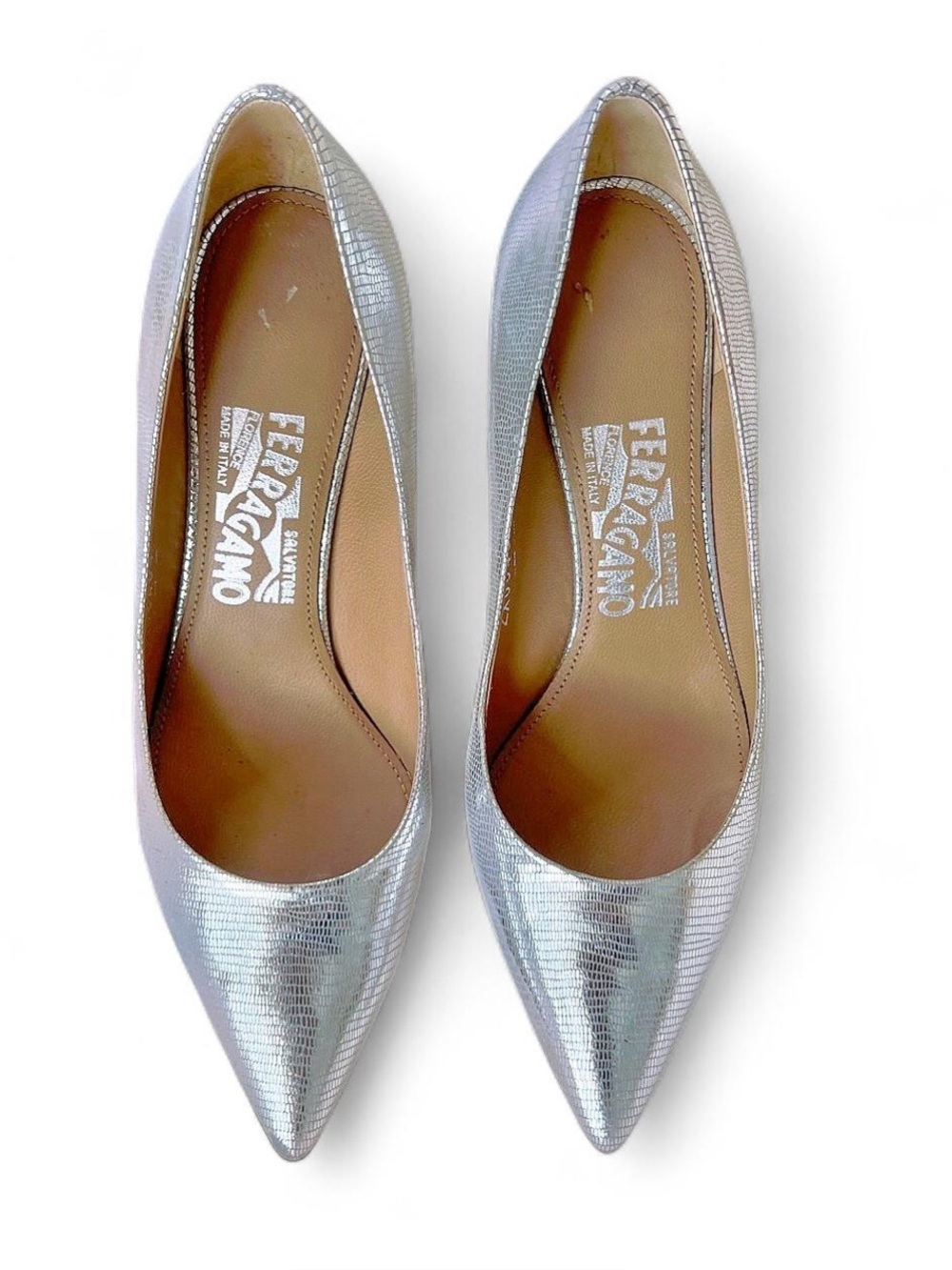 Salvatore Ferragamo Silver Metallic Heels Size 7
#glamour #eveningwear #design